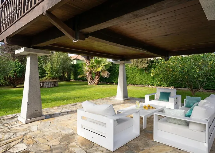 Casa En La Costa Con Wifi Jardín Y Barbacoa Casa rural *