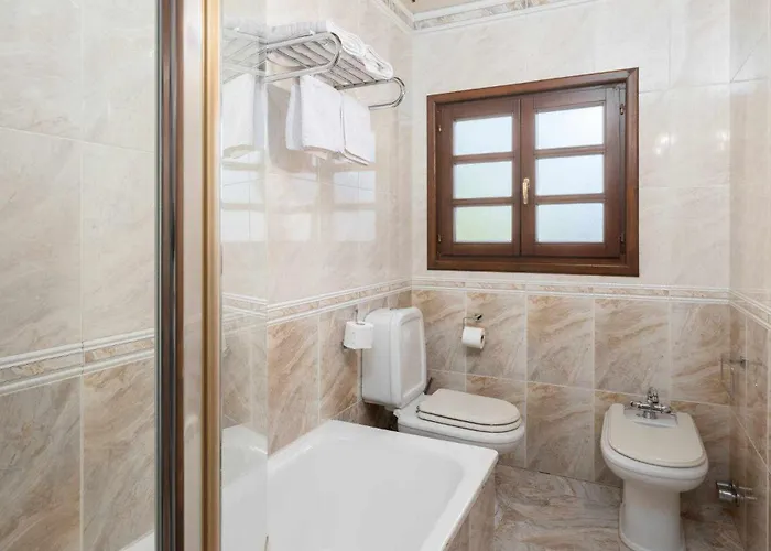 Casa En La Costa Con Wifi Jardín Y Barbacoa Casa rural *