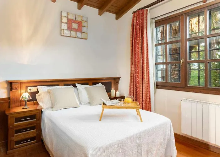 Casa En La Costa Con Wifi Jardín Y Barbacoa Casa rural *